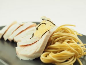 Poached Chicken with Ramen Noodles and Ginger and Sansho Pepper Flavour Pearls