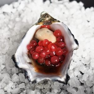 Oyster with Bloody Mary Mix and Native Bush Tomato Flavour Pearls